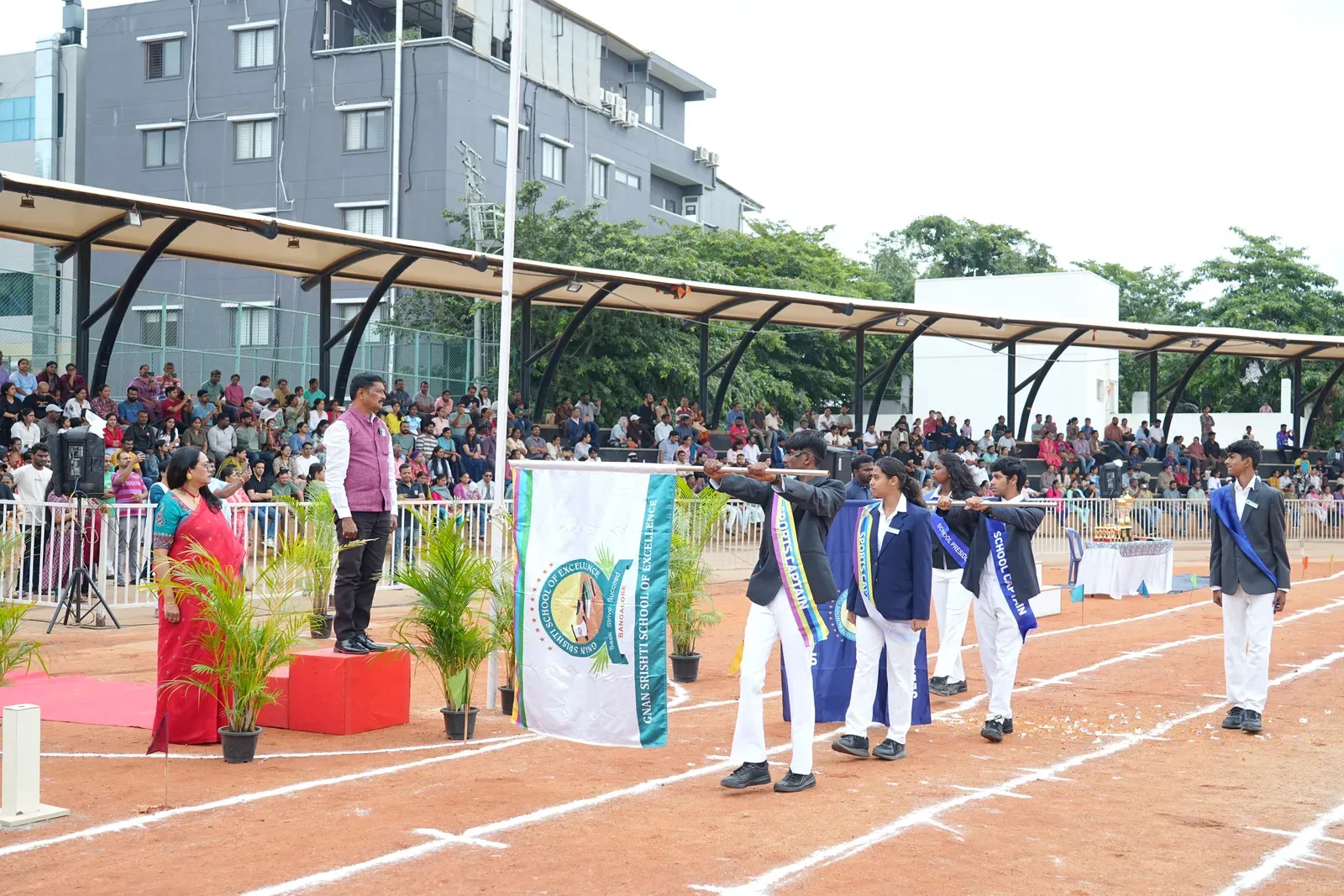 Students taking part in the Annual Sports Day march past