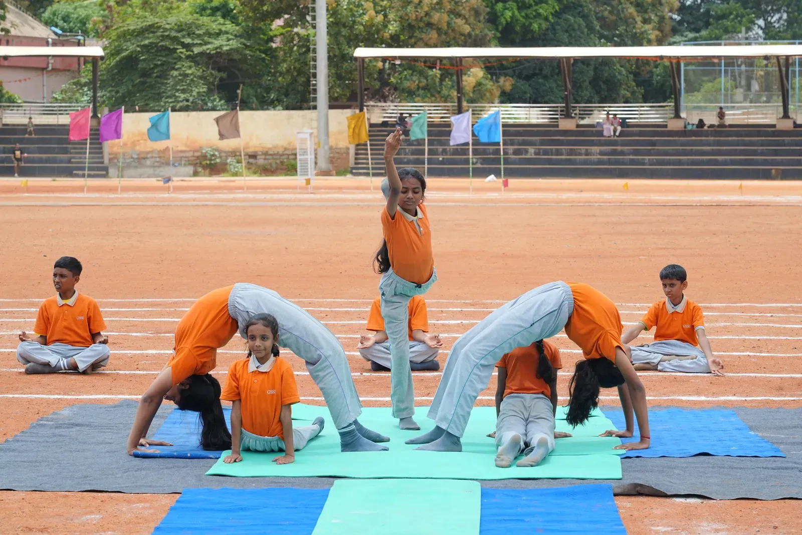 Students practising yoga on International Yoga Day, photo 1 of 8