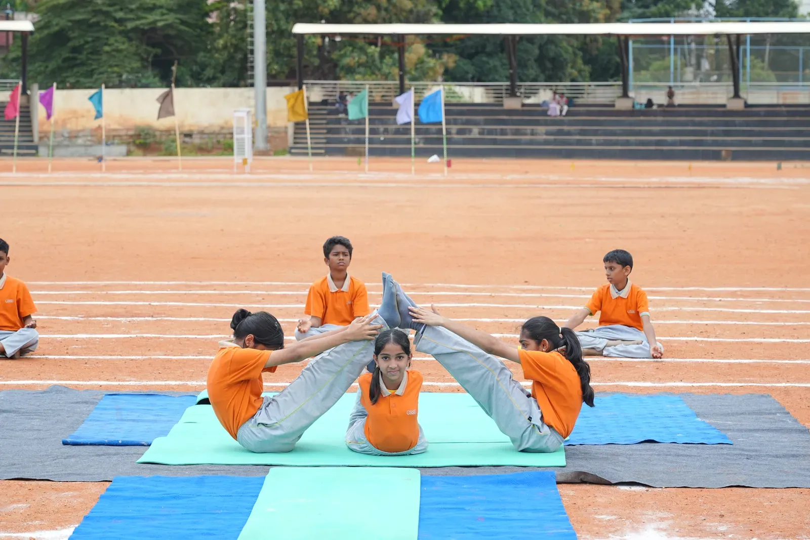 Students practising yoga on International Yoga Day, photo 2 of 8