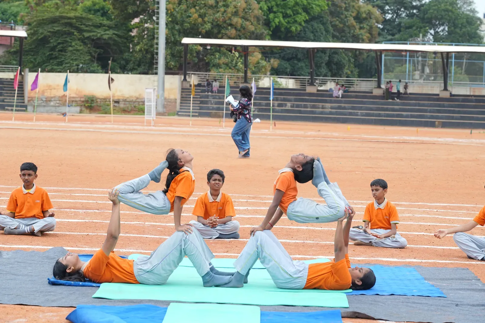 Students practising yoga on International Yoga Day, photo 4 of 8