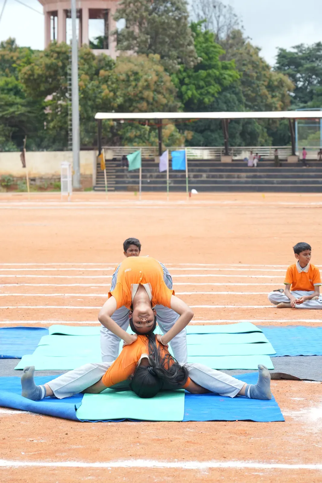 Students practising yoga on International Yoga Day, photo 5 of 8