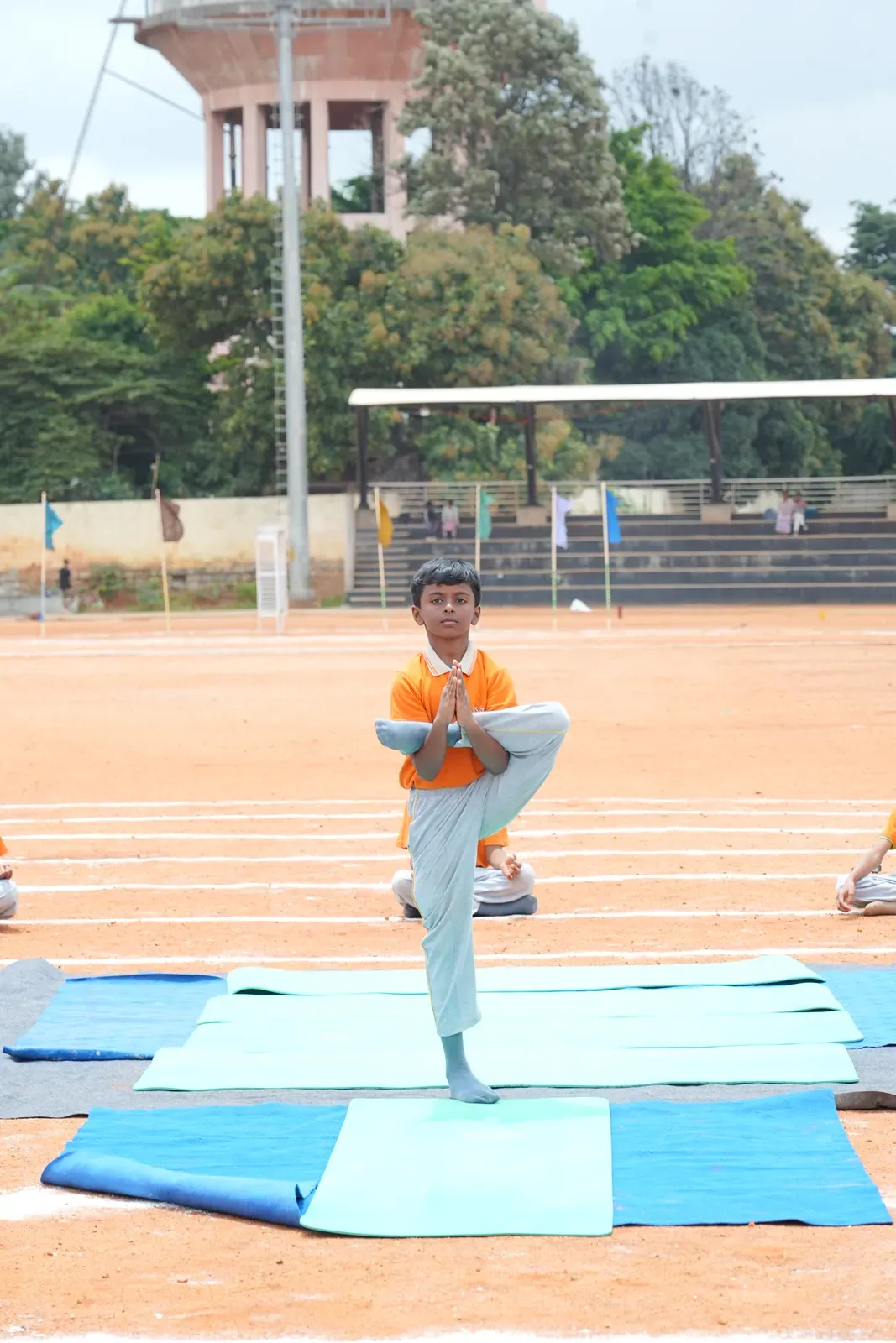 Students practising yoga on International Yoga Day, photo 6 of 8