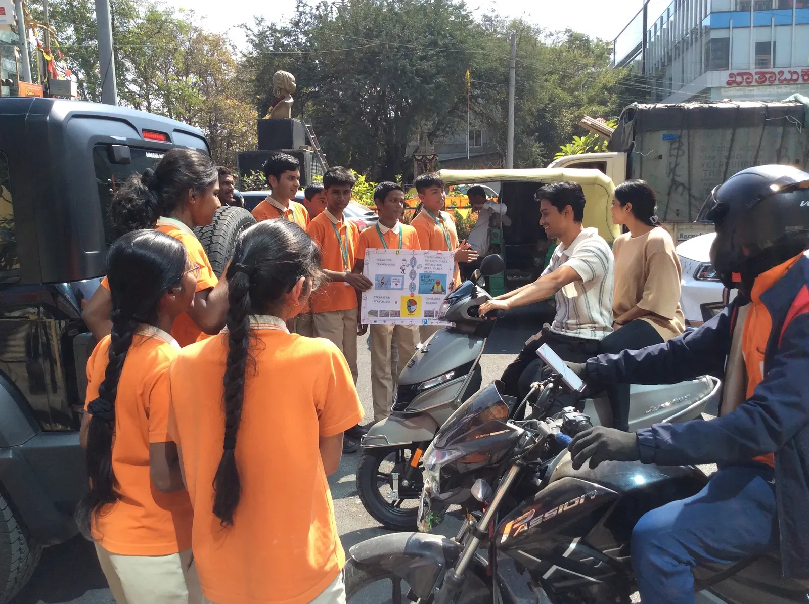 Students taking part in a community awareness activity