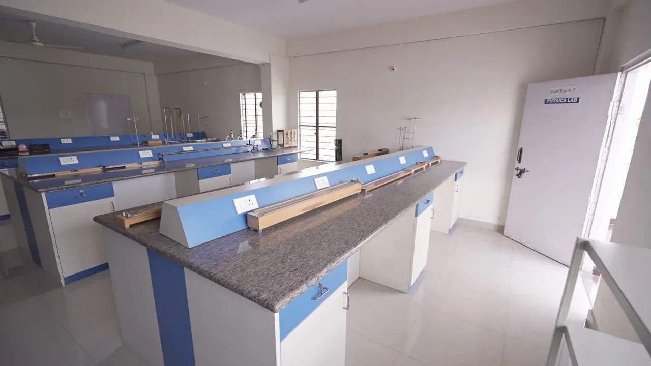 A chemistry lab workbench with taps and glassware