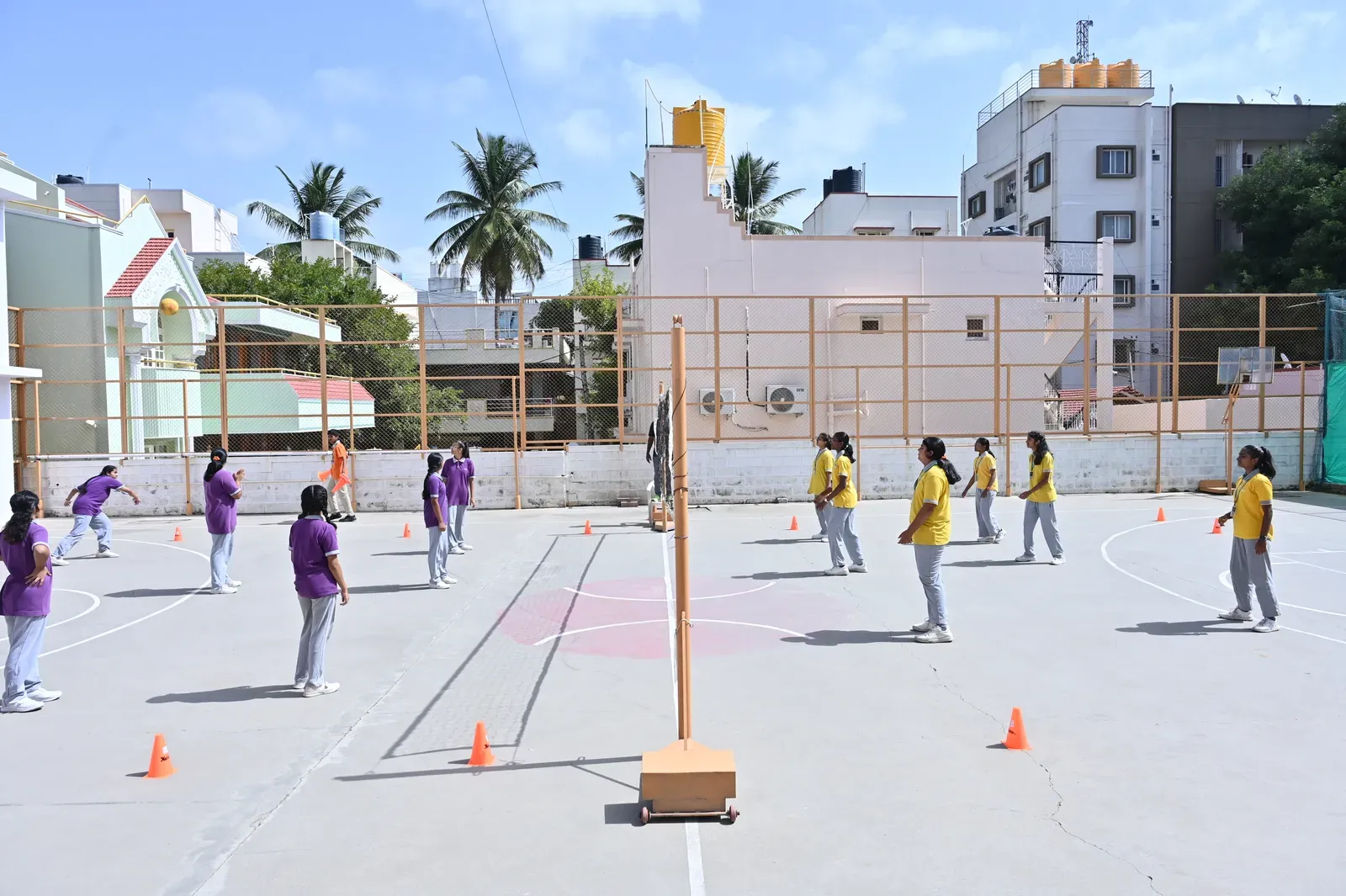 Students playing games on the open campus playground